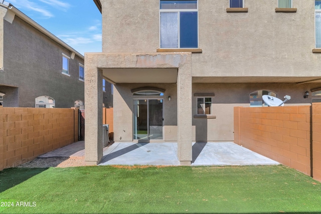 17365 N Cave Creek Rd Unit 116, Phoenix, AZ 85032 - rear view of property featuring stucco siding and a patio area
