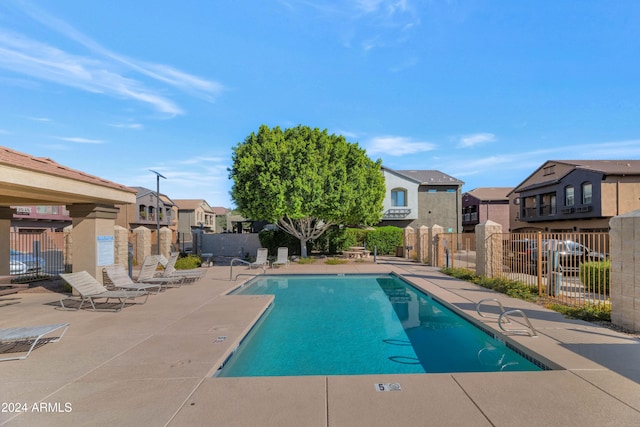 17365 N Cave Creek Rd Unit 116, Phoenix, AZ 85032 - community pool with a residential view and a patio