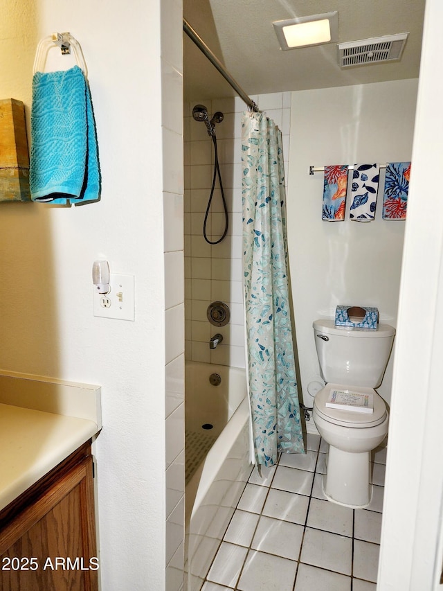 full bathroom with tile patterned floors, vanity, toilet, and shower / tub combo with curtain