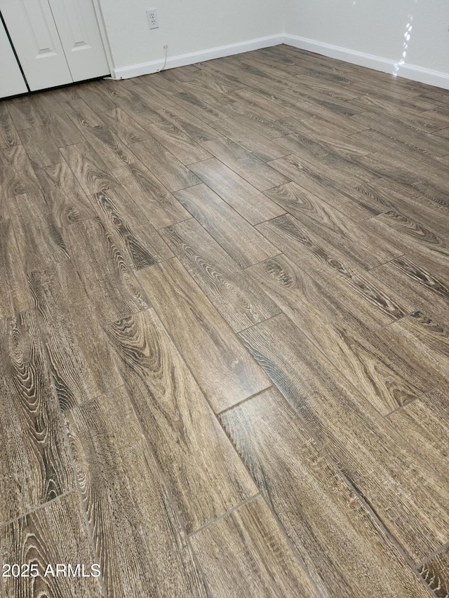 interior details featuring wood-type flooring