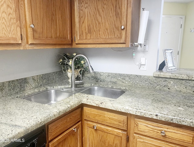 kitchen with sink and dishwasher