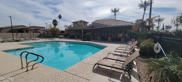 view of swimming pool featuring a patio