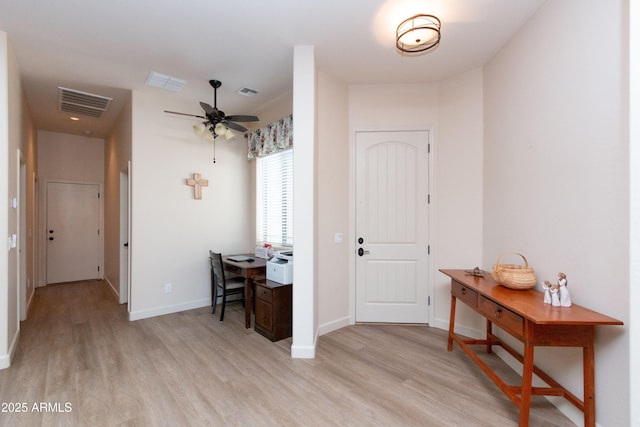 entrance foyer featuring ceiling fan and light wood-type flooring