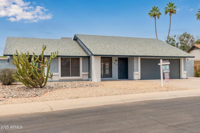 1416 W Highland St, Chandler, AZ 85224 - view of front facade featuring an attached garage, driveway, and roof with shingles