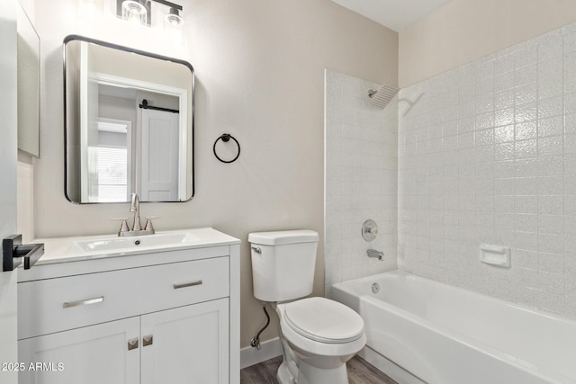1416 W Highland St, Chandler, AZ 85224 - full bathroom featuring wood finished floors, toilet, vanity, and washtub / shower combination
