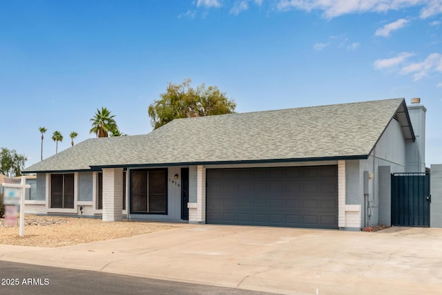 1416 W Highland St, Chandler, AZ 85224 - ranch-style home with a garage, concrete driveway, roof with shingles, brick siding, and a chimney