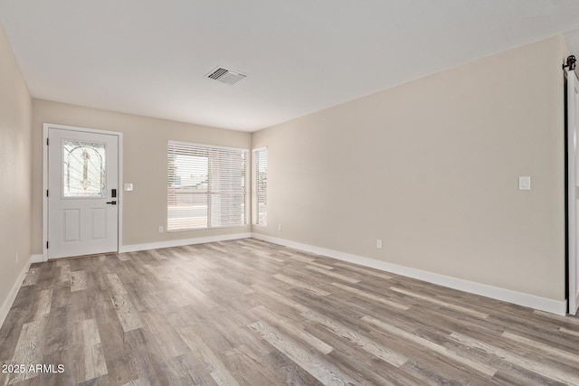 1416 W Highland St, Chandler, AZ 85224 - foyer entrance with wood finished floors and baseboards
