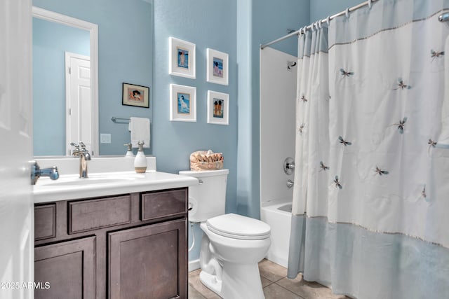 bathroom with tile patterned floors, toilet, vanity, and shower / tub combo