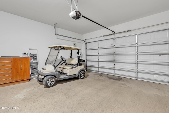 garage featuring a garage door opener