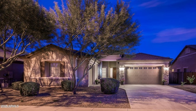 view of front of home with a garage