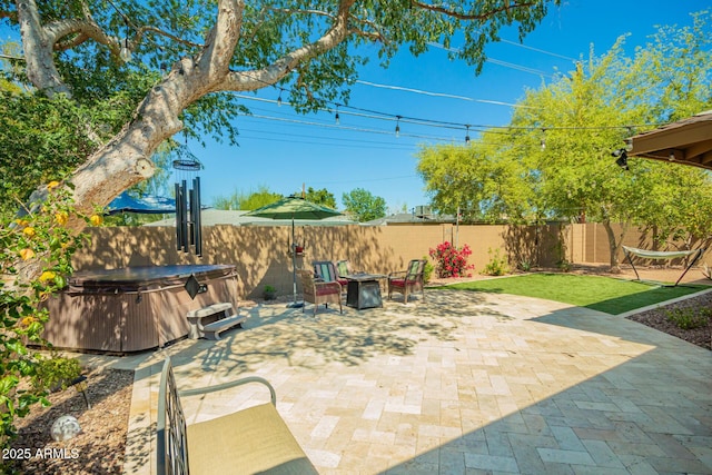 view of patio featuring a fenced backyard