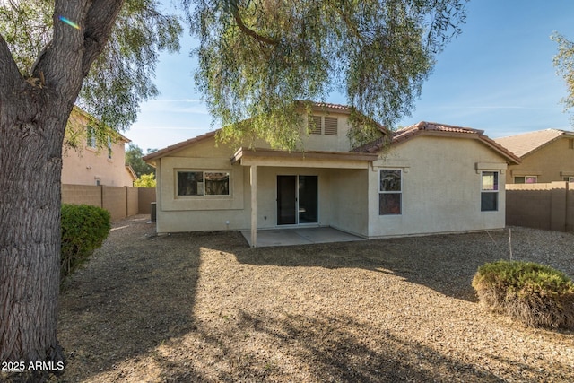 rear view of house with a patio area