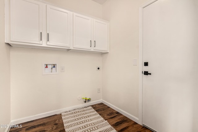 laundry area with hookup for an electric dryer, dark wood-style flooring, washer hookup, baseboards, and cabinet space