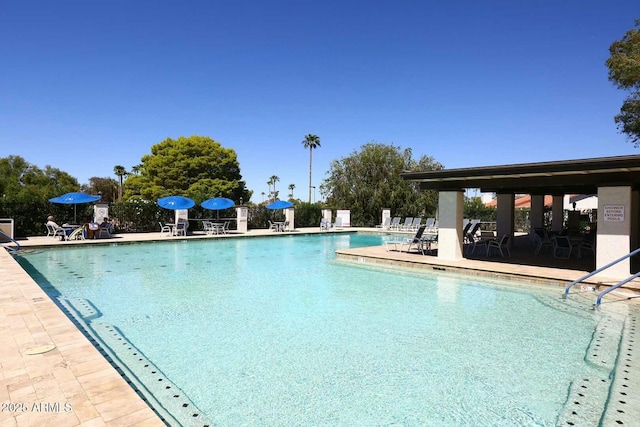 pool with a patio