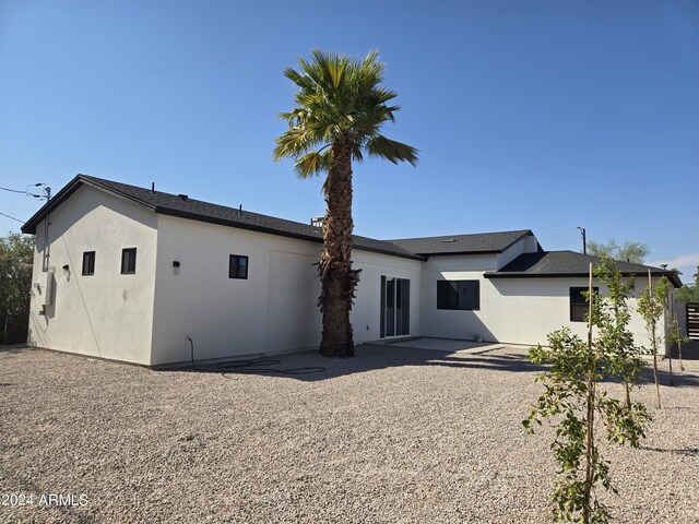 back of house featuring a patio