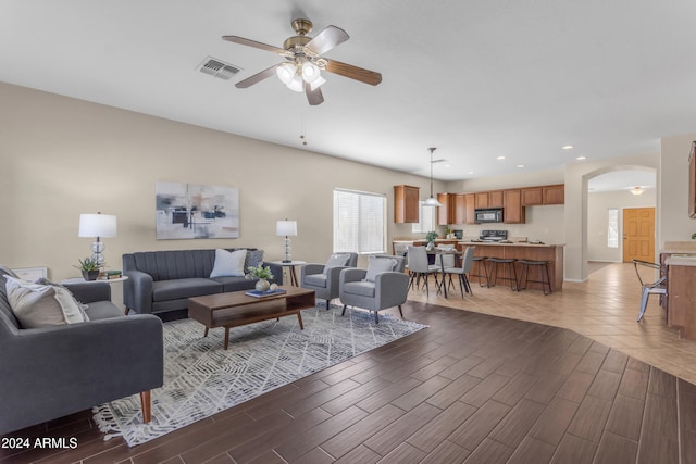 living room with ceiling fan