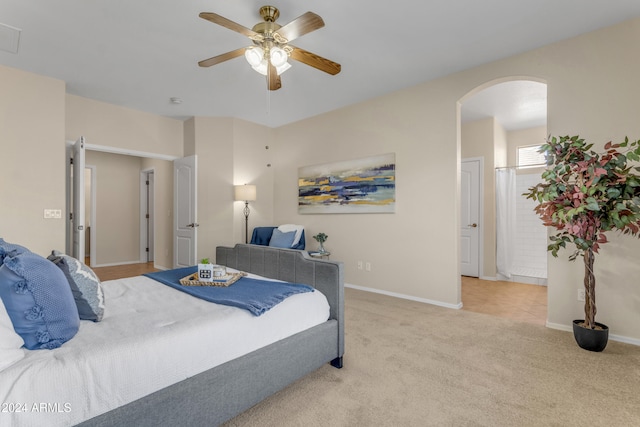 carpeted bedroom with ceiling fan