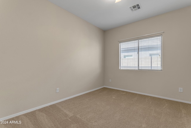 unfurnished room with carpet