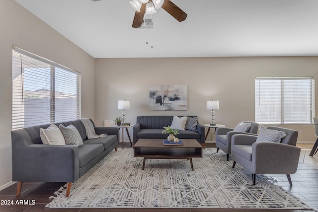 living room with hardwood / wood-style floors and ceiling fan