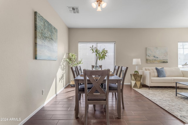 dining room featuring dark wood-type flooring