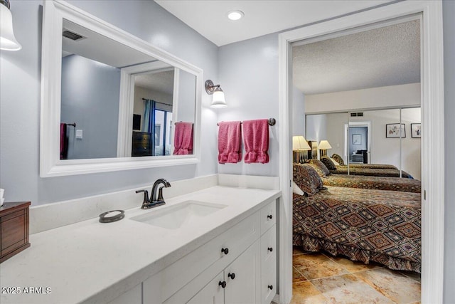 9450 N 94th Pl Unit 106, Scottsdale, AZ 85258 - ensuite bathroom with vanity