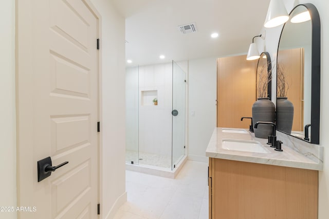7127 N 79th St, Scottsdale, AZ 85258 - full bath with a shower stall, double vanity, recessed lighting, and tile patterned flooring