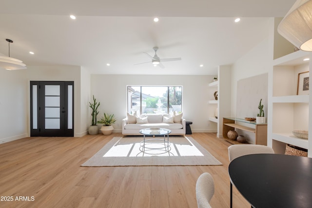 7127 N 79th St, Scottsdale, AZ 85258 - living room featuring wood finished floors, baseboards, ceiling fan, built in shelves, and recessed lighting
