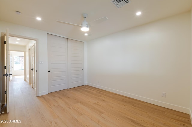 7127 N 79th St, Scottsdale, AZ 85258 - unfurnished bedroom with light wood-style flooring, baseboards, recessed lighting, a closet, and a ceiling fan