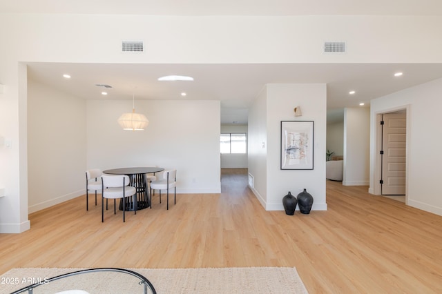 7127 N 79th St, Scottsdale, AZ 85258 - dining room featuring wood finished floors, baseboards, and recessed lighting
