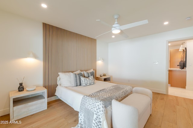 7127 N 79th St, Scottsdale, AZ 85258 - bedroom with light wood finished floors, recessed lighting, ceiling fan, and baseboards