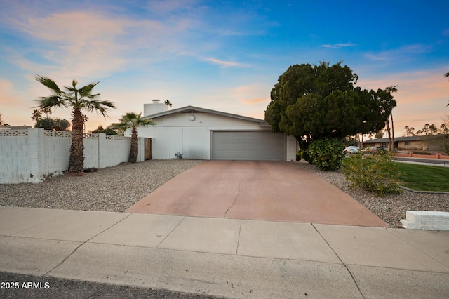 view of front of property featuring a garage