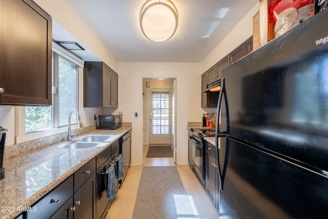 602 E Colgate Dr, Tempe, AZ 85283 - kitchen featuring black appliances, a sink, healthy amount of natural light, and light tile patterned flooring