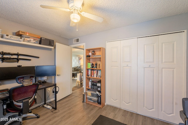 602 E Colgate Dr, Tempe, AZ 85283 - office area featuring ceiling fan, wood finished floors, and a textured ceiling