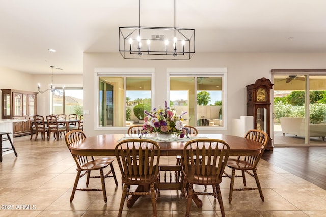 2457 E Melrose St, Mesa, AZ 85213 - dining area featuring a chandelier, plenty of natural light, tile patterned flooring, and recessed lighting