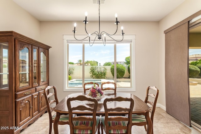 2457 E Melrose St, Mesa, AZ 85213 - dining room with a chandelier