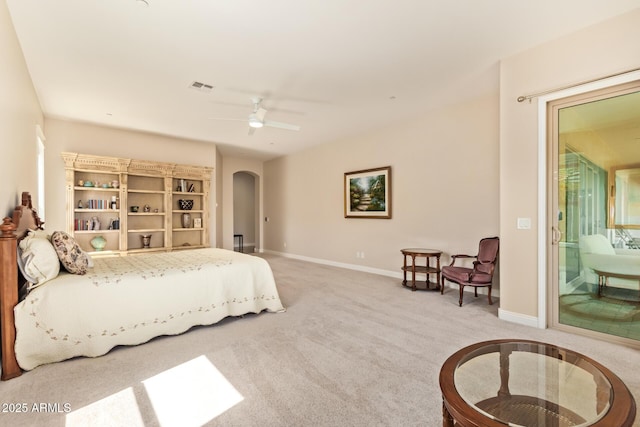 2457 E Melrose St, Mesa, AZ 85213 - bedroom featuring access to outside, arched walkways, carpet flooring, and baseboards