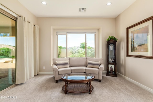 2457 E Melrose St, Mesa, AZ 85213 - living room with light colored carpet, baseboards, and recessed lighting
