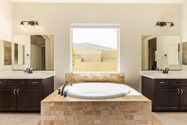 2457 E Melrose St, Mesa, AZ 85213 - full bathroom featuring a garden tub and two vanities
