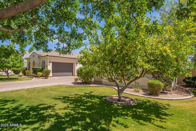 2457 E Melrose St, Mesa, AZ 85213 - view of front of property featuring stucco siding, a tile roof, decorative driveway, a front yard, and a garage