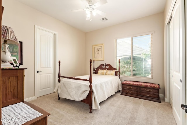 2457 E Melrose St, Mesa, AZ 85213 - bedroom featuring light colored carpet, baseboards, and a ceiling fan