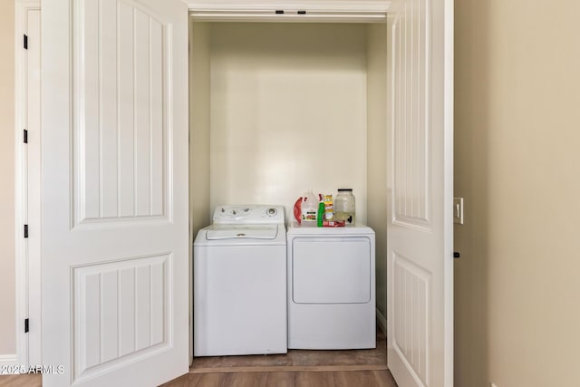 2457 E Melrose St, Mesa, AZ 85213 - washroom featuring washer and clothes dryer and dark wood finished floors