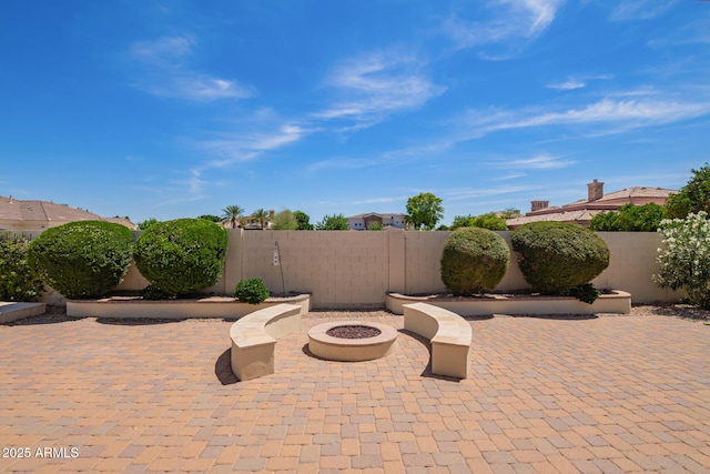 2457 E Melrose St, Mesa, AZ 85213 - fenced backyard featuring a patio and a fire pit