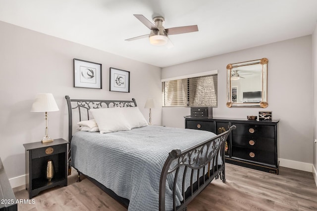 6480 N 82nd St Unit 1136, Scottsdale, AZ 85250 - bedroom featuring light wood finished floors, baseboards, and ceiling fan