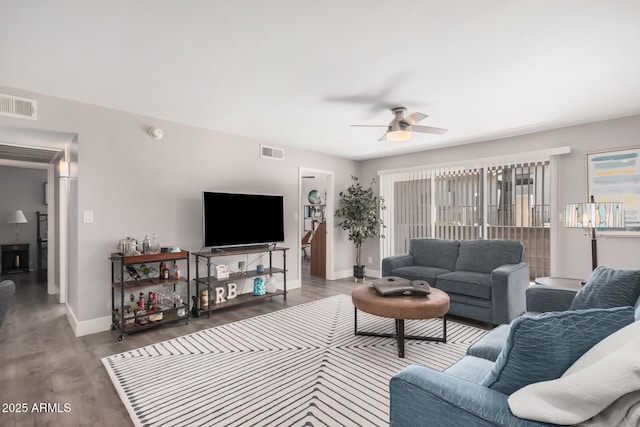 6480 N 82nd St Unit 1136, Scottsdale, AZ 85250 - living area featuring ceiling fan, baseboards, and wood finished floors