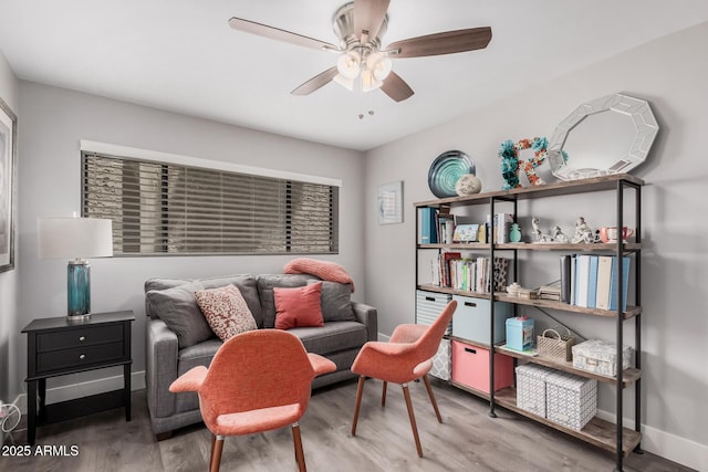 6480 N 82nd St Unit 1136, Scottsdale, AZ 85250 - sitting room with ceiling fan, wood finished floors, and baseboards