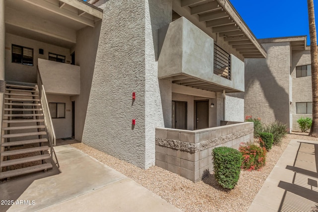 6480 N 82nd St Unit 1136, Scottsdale, AZ 85250 - view of exterior entry with stucco siding