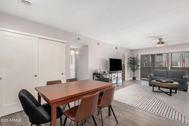 6480 N 82nd St Unit 1136, Scottsdale, AZ 85250 - dining room featuring wood finished floors and ceiling fan