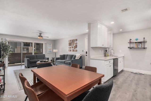 6480 N 82nd St Unit 1136, Scottsdale, AZ 85250 - dining space with a ceiling fan, light wood-type flooring, recessed lighting, and baseboards