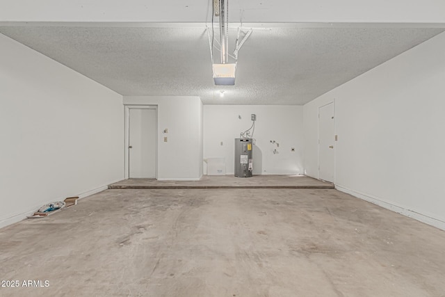 6701 W Monterey Way, Phoenix, AZ 85033 - garage featuring water heater and a garage door opener
