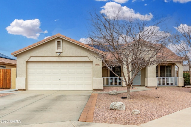 ranch-style home featuring stucco siding, driveway, a tile roof, covered porch, and an attached garage